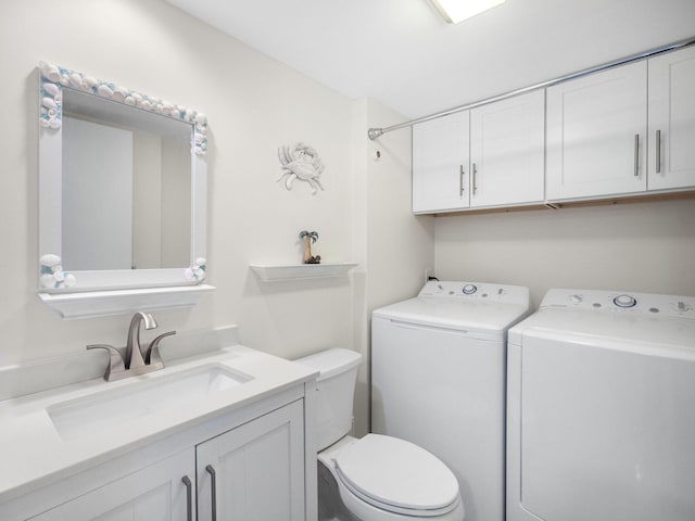 1206 12th Ct, Jupiter, FL 33477 - bathroom with washing machine and dryer and vanity