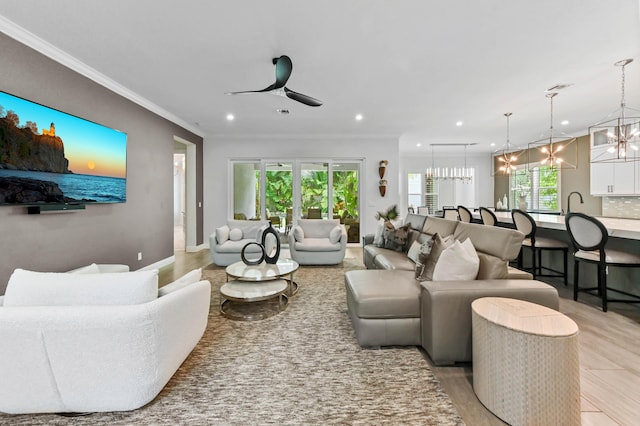 4112 Italia Way, Lake Worth, FL 33467 - living area featuring recessed lighting, a chandelier, ceiling fan, and ornamental molding