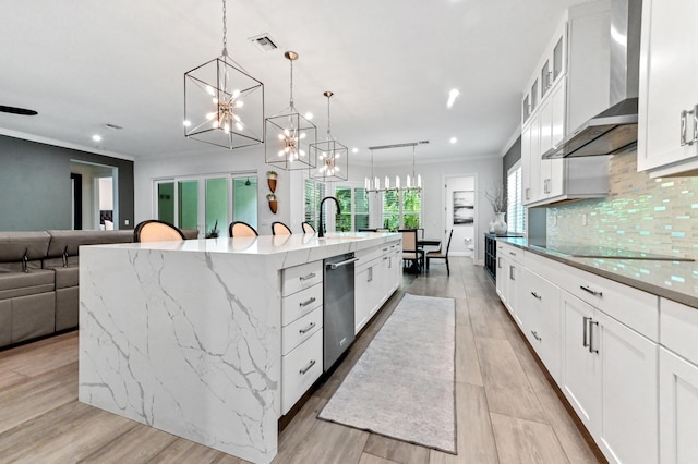 4112 Italia Way, Lake Worth, FL 33467 - kitchen featuring wall chimney exhaust hood, dishwasher, black electric stovetop, recessed lighting, and a chandelier