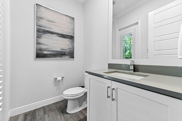 4112 Italia Way, Lake Worth, FL 33467 - half bath featuring vanity, wood finished floors, and crown molding