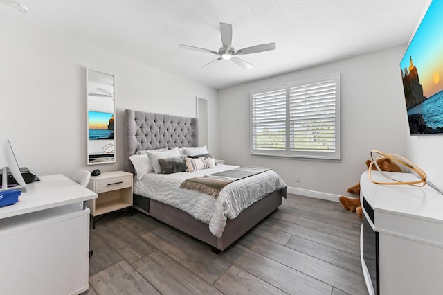 4112 Italia Way, Lake Worth, FL 33467 - bedroom with dark wood-style floors, a ceiling fan, and an office area