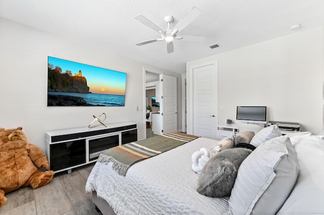 4112 Italia Way, Lake Worth, FL 33467 - bedroom with wood finished floors and ceiling fan
