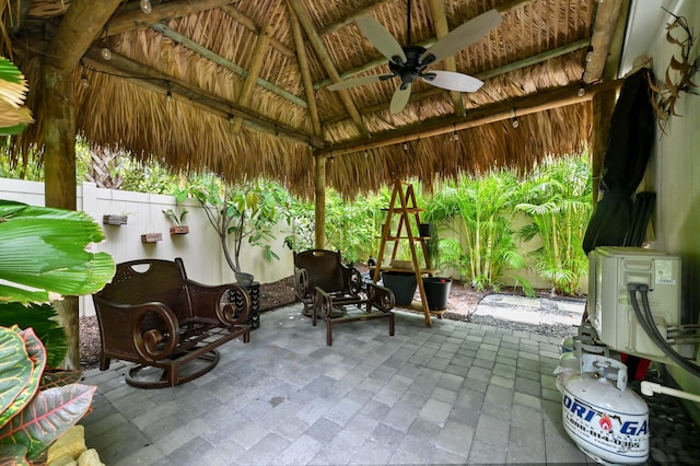 4112 Italia Way, Lake Worth, FL 33467 - fenced backyard featuring a gazebo, a ceiling fan, and a patio