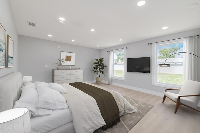 2058 SE Watercrest St, Port Saint Lucie, FL 34984 - bedroom with wood finished floors and recessed lighting