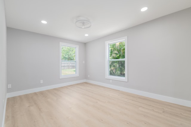 2058 SE Watercrest St, Port Saint Lucie, FL 34984 - spare room featuring light wood-type flooring and recessed lighting
