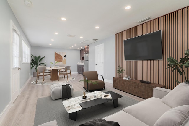 2058 SE Watercrest St, Port Saint Lucie, FL 34984 - living room featuring light wood finished floors, recessed lighting, and an accent wall