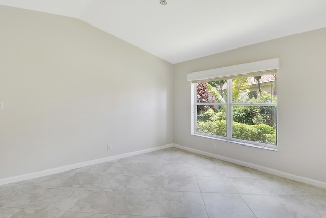 1466 Artimino Ln, Boynton Beach, FL 33436 - unfurnished room with vaulted ceiling and light tile patterned floors