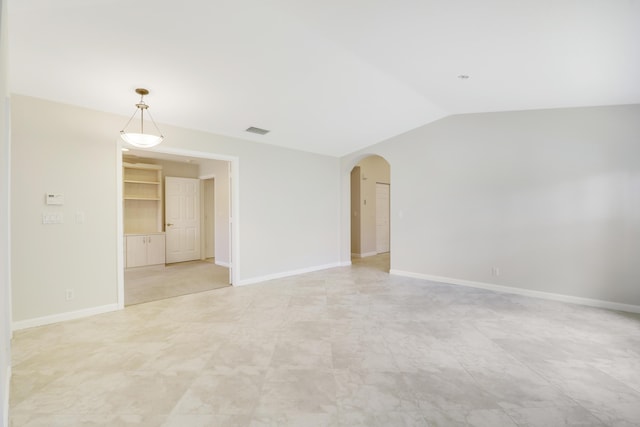 1466 Artimino Ln, Boynton Beach, FL 33436 - unfurnished room with arched walkways and lofted ceiling