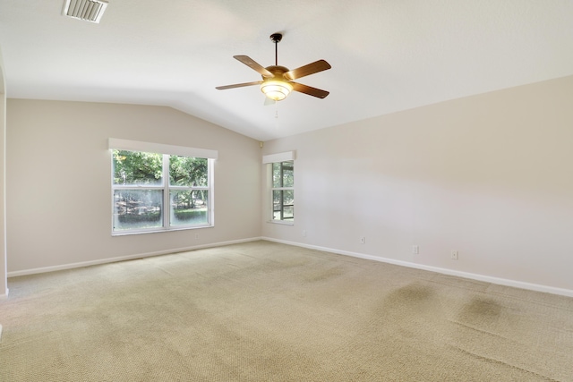 1466 Artimino Ln, Boynton Beach, FL 33436 - empty room with light carpet, ceiling fan, and vaulted ceiling