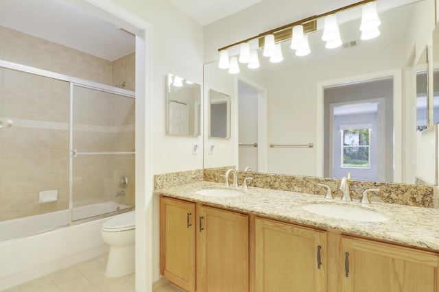 1466 Artimino Ln, Boynton Beach, FL 33436 - bathroom featuring tile patterned floors, double vanity, and combined bath / shower with glass door