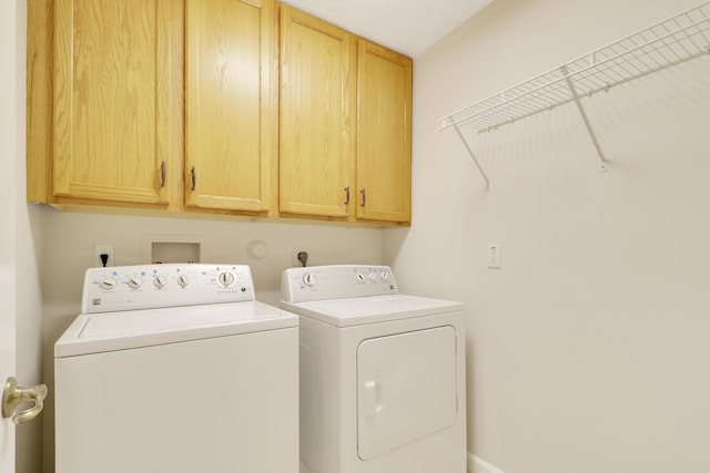 1466 Artimino Ln, Boynton Beach, FL 33436 - laundry area with cabinet space and washer and clothes dryer