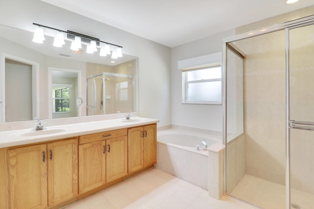 1466 Artimino Ln, Boynton Beach, FL 33436 - bathroom featuring a shower stall, a garden tub, double vanity, and tile patterned floors