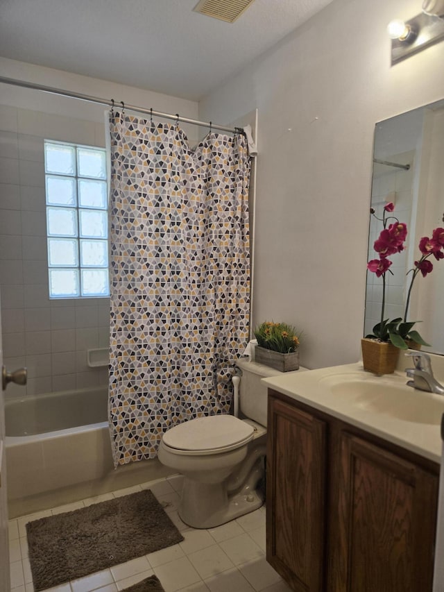 2137 Little Torch St, Riviera Beach, FL 33407 - full bathroom featuring vanity, tile patterned flooring, and shower / bath combination with curtain