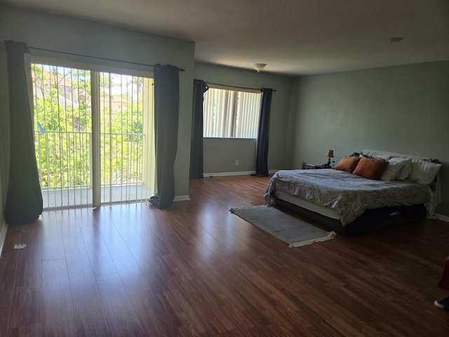 2137 Little Torch St, Riviera Beach, FL 33407 - bedroom featuring dark wood finished floors and baseboards