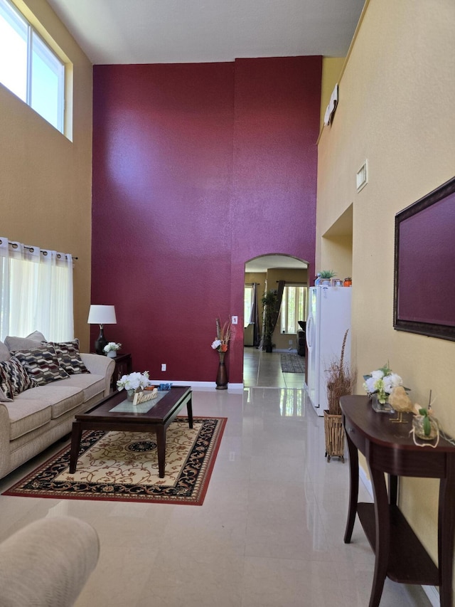 2137 Little Torch St, Riviera Beach, FL 33407 - living area with a towering ceiling and arched walkways