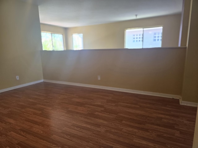 2137 Little Torch St, Riviera Beach, FL 33407 - unfurnished room with dark wood-style floors and baseboards