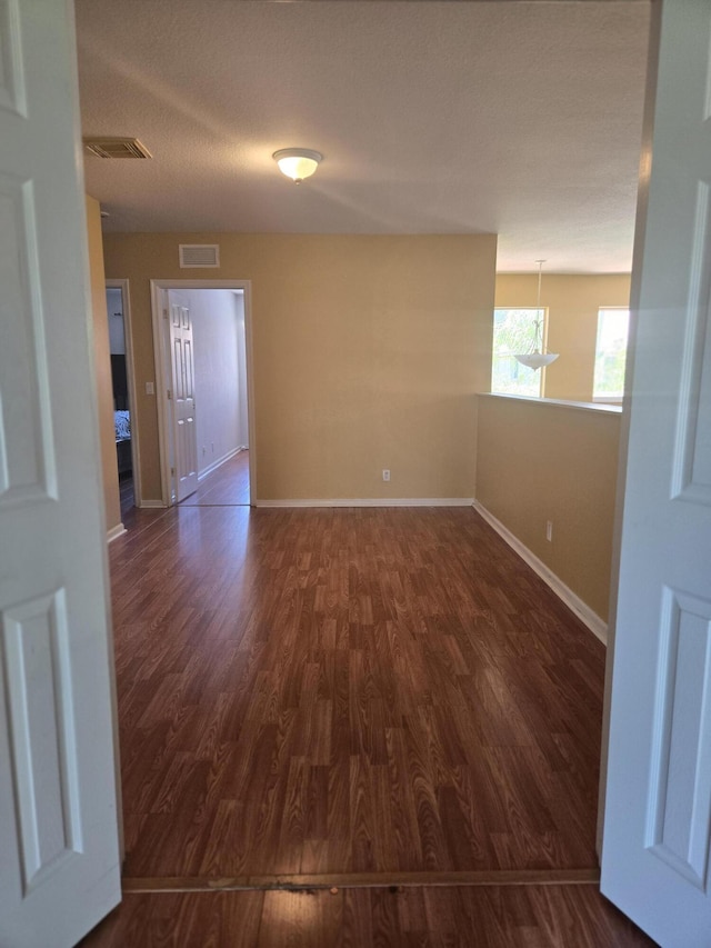 2137 Little Torch St, Riviera Beach, FL 33407 - spare room with dark wood finished floors and baseboards