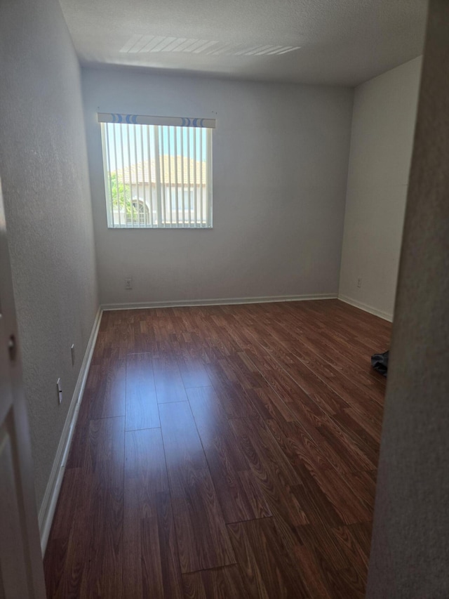 2137 Little Torch St, Riviera Beach, FL 33407 - spare room with wood finished floors and baseboards
