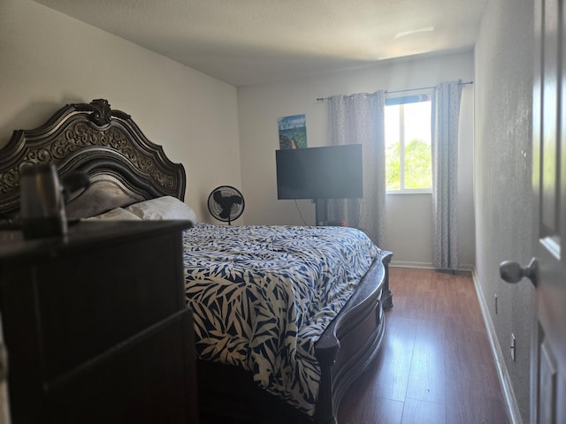2137 Little Torch St, Riviera Beach, FL 33407 - bedroom featuring wood finished floors and baseboards