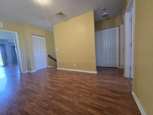2137 Little Torch St, Riviera Beach, FL 33407 - empty room with dark wood finished floors and a smoke detector