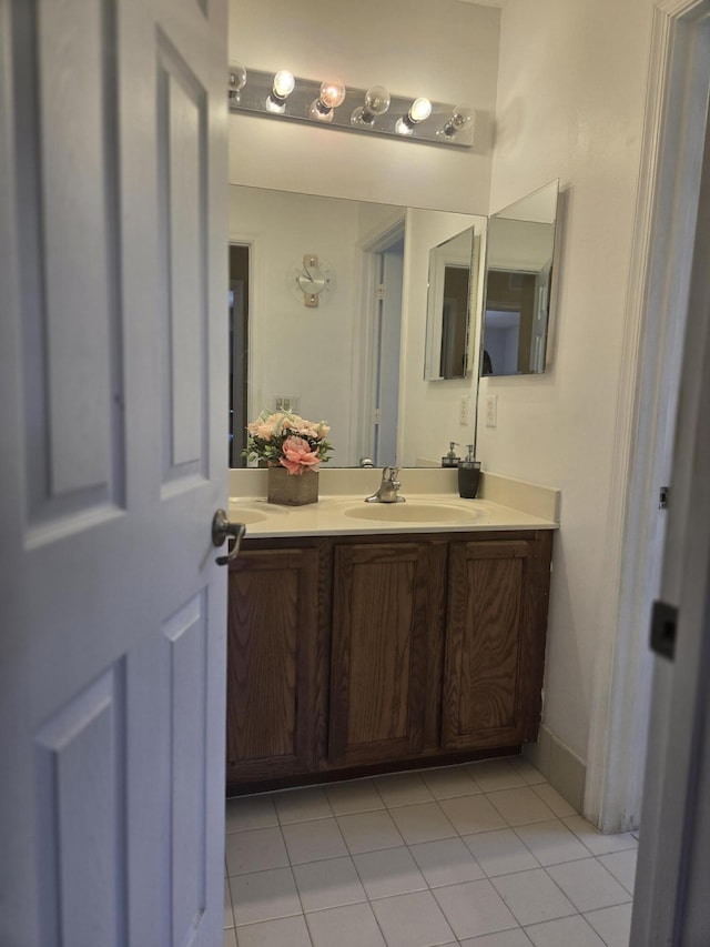 2137 Little Torch St, Riviera Beach, FL 33407 - bathroom with vanity and tile patterned flooring