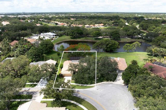 166 Bayberry Cir, Jupiter, FL 33458 - aerial view of residential area with property boundaries highlighted and a nearby body of water