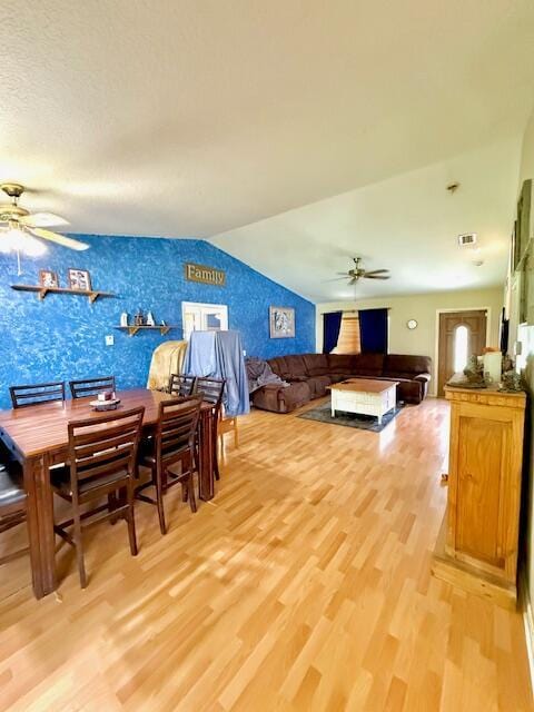 15252 74th St Unit N, The Acreage, FL 33470 - dining space featuring ceiling fan, light wood-style flooring, and lofted ceiling