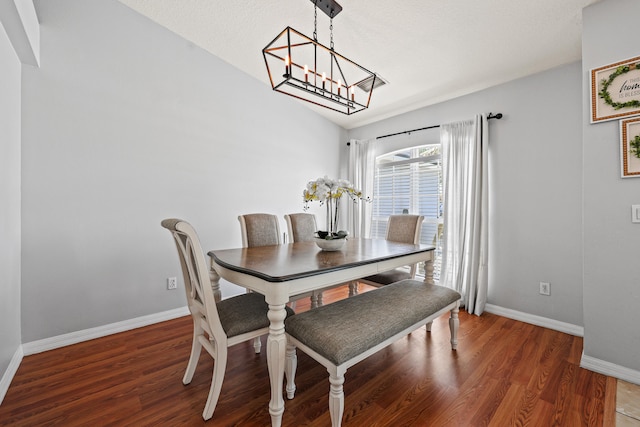 421 NW Cornell Ave, Port Saint Lucie, FL 34983 - dining area featuring wood finished floors and a chandelier