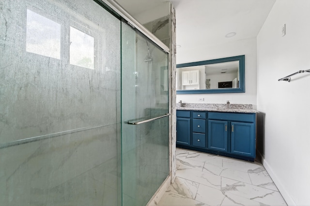 4364 N Mary Cir, Palm Beach Gardens, FL 33410 - bathroom featuring a stall shower, double vanity, and marble finish floors