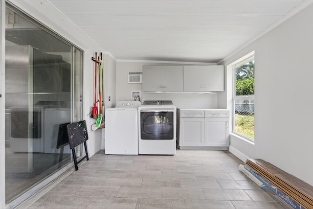 4364 N Mary Cir, Palm Beach Gardens, FL 33410 - laundry room featuring cabinet space, separate washer and dryer, and ornamental molding