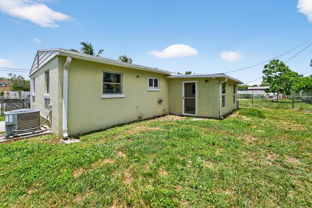 4364 N Mary Cir, Palm Beach Gardens, FL 33410 - back of house featuring stucco siding