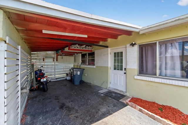 4364 N Mary Cir, Palm Beach Gardens, FL 33410 - entrance to property featuring a carport