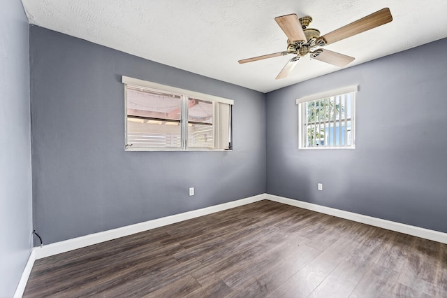 4364 N Mary Cir, Palm Beach Gardens, FL 33410 - empty room with wood finished floors and a ceiling fan