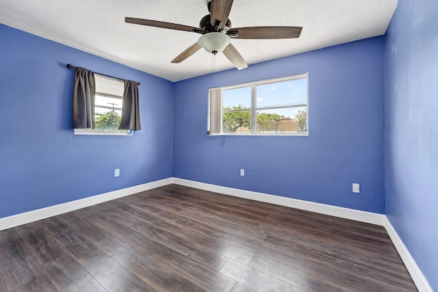 4364 N Mary Cir, Palm Beach Gardens, FL 33410 - spare room featuring healthy amount of natural light, ceiling fan, and wood finished floors