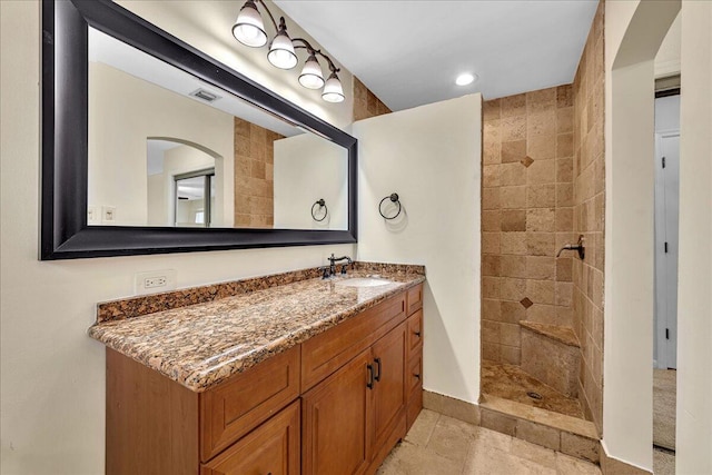 11061 NW 45th St, Coral Springs, FL 33065 - bathroom with tiled shower, vanity, and recessed lighting
