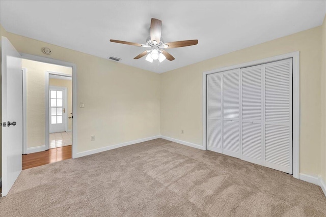 11061 NW 45th St, Coral Springs, FL 33065 - unfurnished bedroom with carpet flooring, a closet, and a ceiling fan