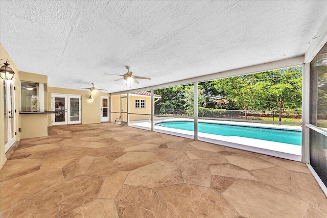 11061 NW 45th St, Coral Springs, FL 33065 - view of swimming pool featuring french doors, a patio, and a ceiling fan
