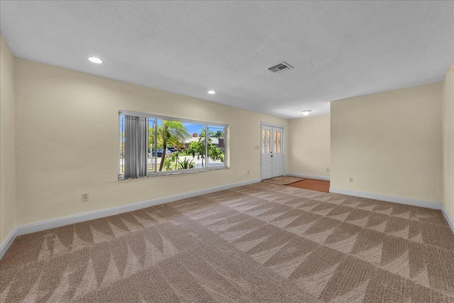 11061 NW 45th St, Coral Springs, FL 33065 - unfurnished room featuring carpet floors, recessed lighting, and a textured ceiling