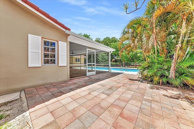 11061 NW 45th St, Coral Springs, FL 33065 - view of patio with a sunroom and a ceiling fan