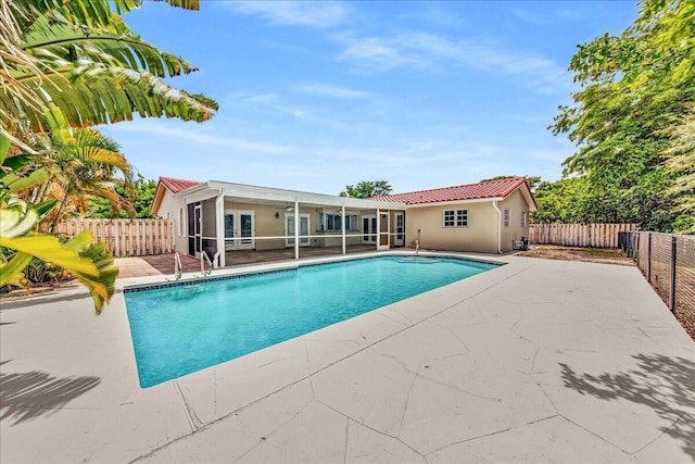 11061 NW 45th St, Coral Springs, FL 33065 - view of pool with a patio and french doors