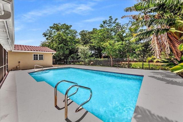 11061 NW 45th St, Coral Springs, FL 33065 - view of pool with a patio