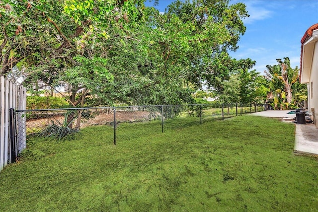 11061 NW 45th St, Coral Springs, FL 33065 - view of yard with a patio