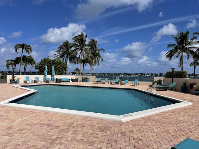 5200 N Flagler Dr Unit 1106, West Palm Beach, FL 33407 - community pool featuring a patio