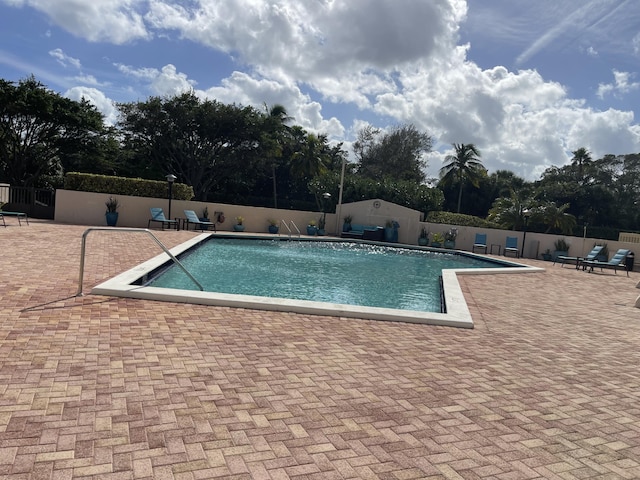 5200 N Flagler Dr Unit 1106, West Palm Beach, FL 33407 - community pool with a patio area