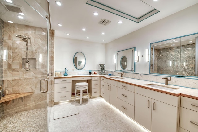 116 Dunes Edge Rd, Jupiter, FL 33477 - bathroom with double vanity, a stall shower, and recessed lighting