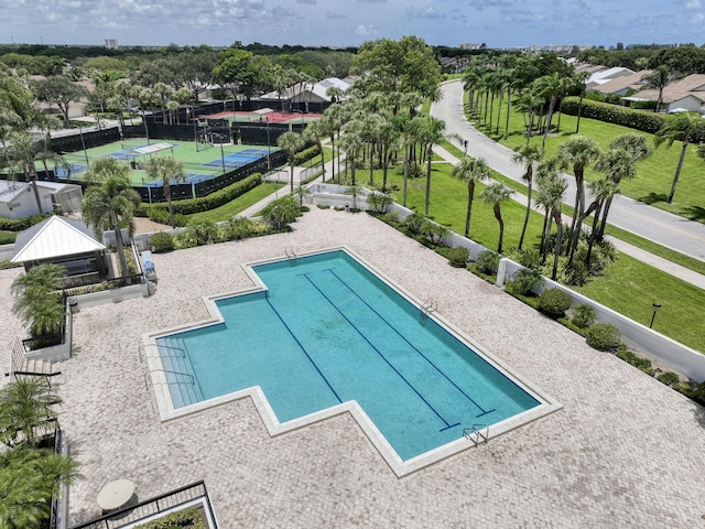 116 Dunes Edge Rd, Jupiter, FL 33477 - community pool featuring a yard
