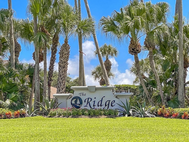 116 Dunes Edge Rd, Jupiter, FL 33477 - community sign featuring a lawn