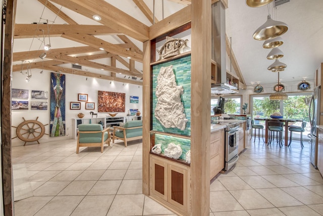 116 Dunes Edge Rd, Jupiter, FL 33477 - kitchen with stainless steel range with electric cooktop, light tile patterned floors, high vaulted ceiling, beamed ceiling, and decorative light fixtures