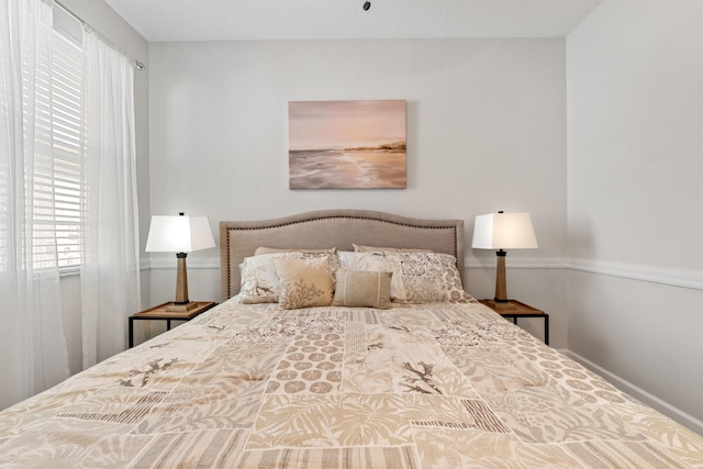 876 SW Rocky Bayou Ter, Port Saint Lucie, FL 34986 - bedroom with baseboards