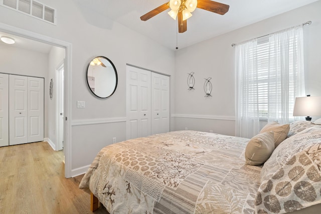 876 SW Rocky Bayou Ter, Port Saint Lucie, FL 34986 - bedroom with light wood-style floors, a closet, and a ceiling fan